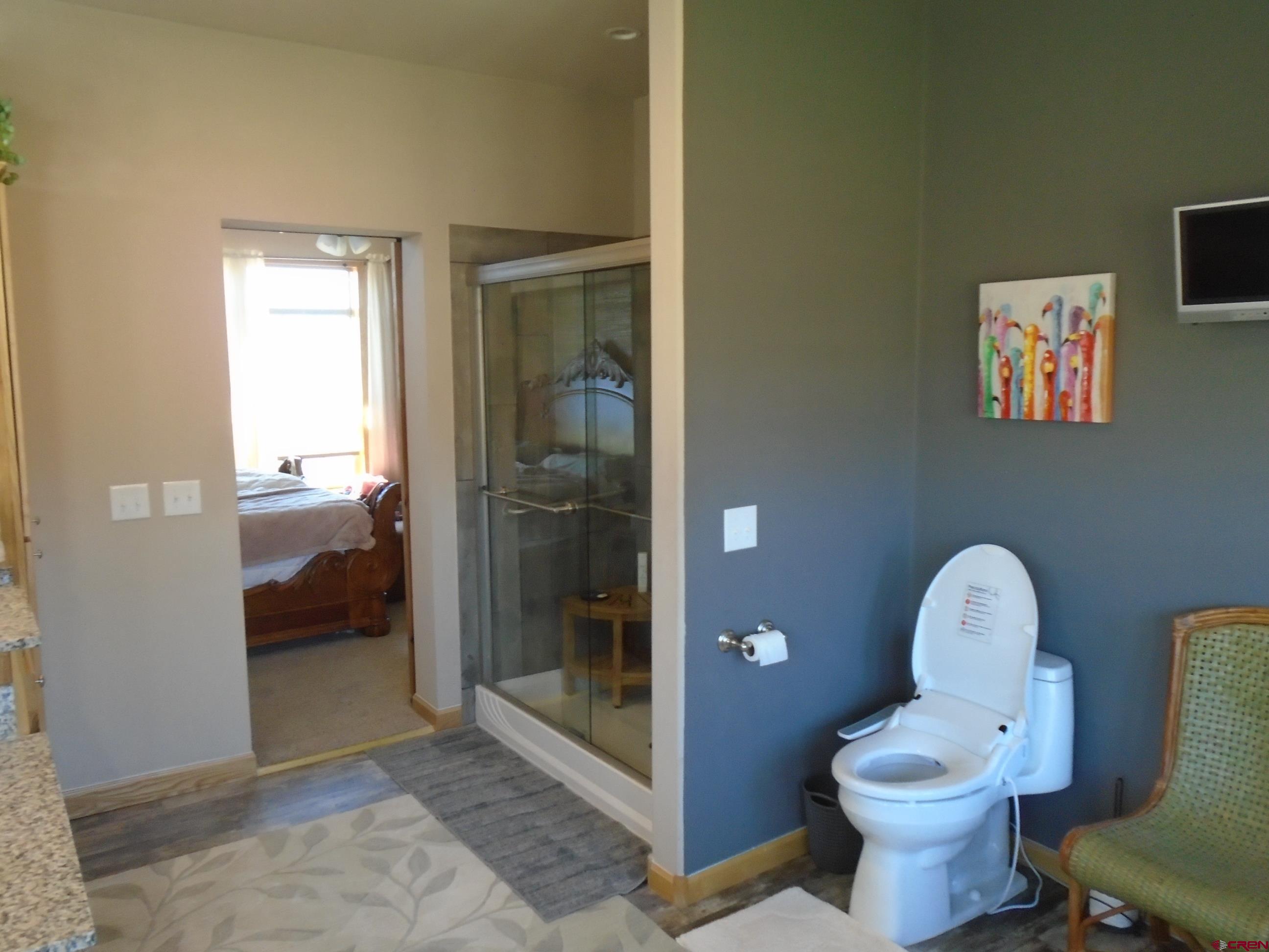23041 T Road Cedaredge, CO 81413 - Photo 28 of 28 a bathroom with a toilet and a shower