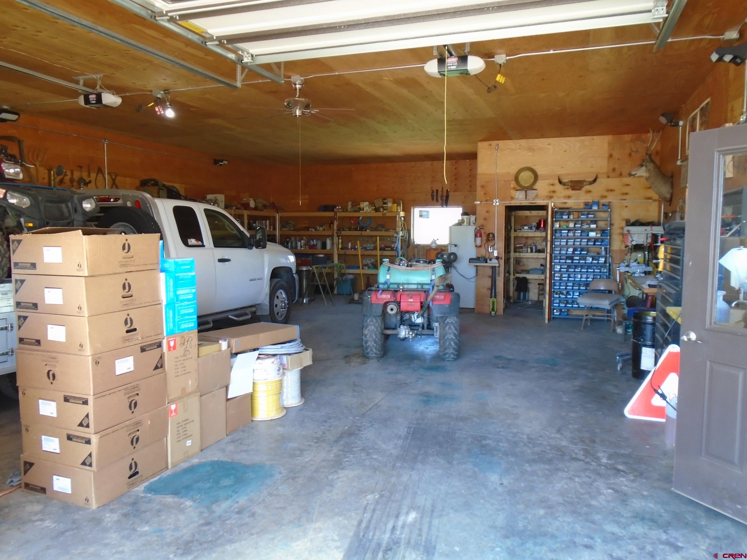 23041 T Road Cedaredge, CO 81413 - Photo 5 of 28 a view of storage and utility room