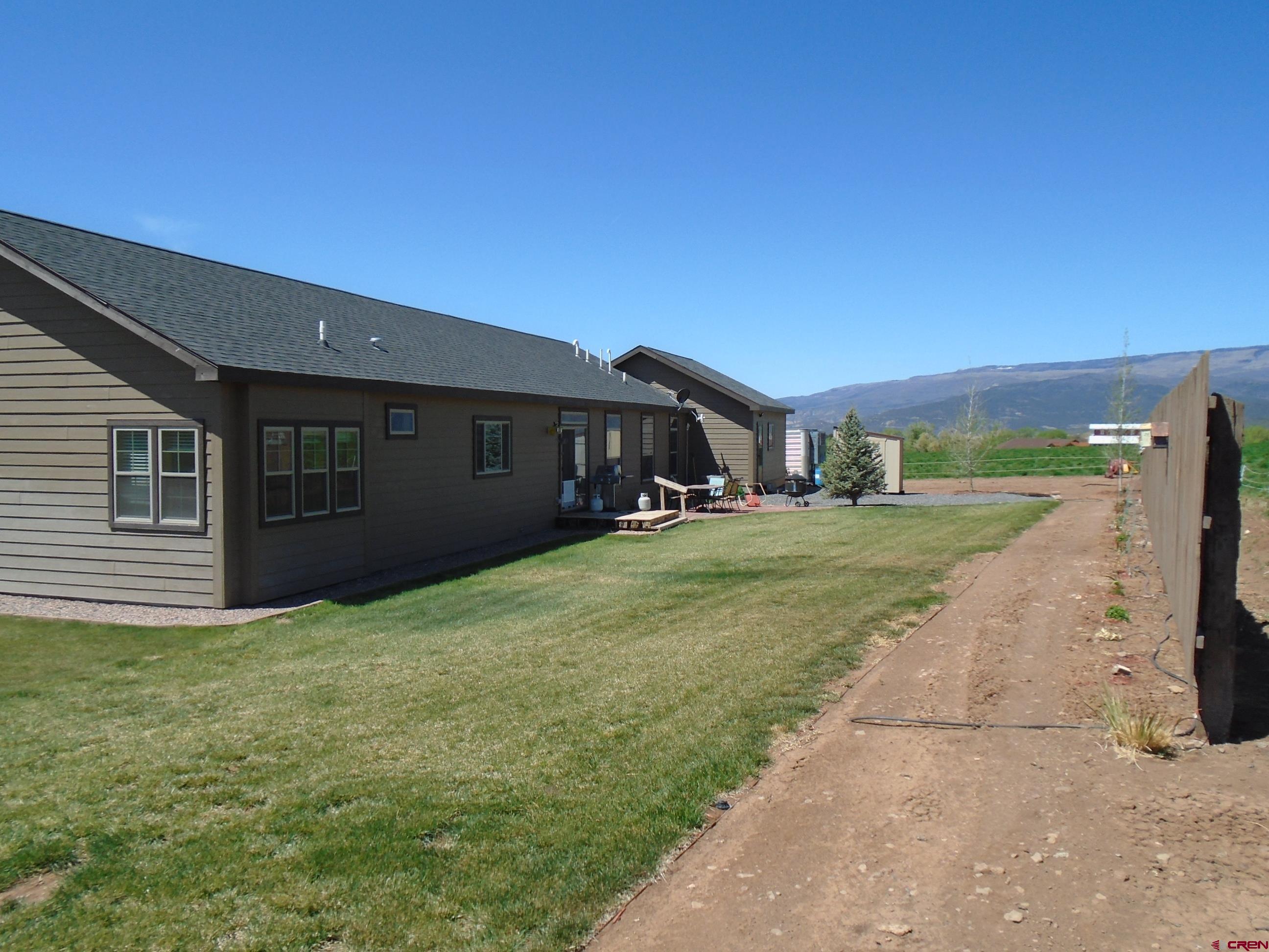 23041 T Road Cedaredge, CO 81413 - Photo 8 of 28 a house view with a garden space