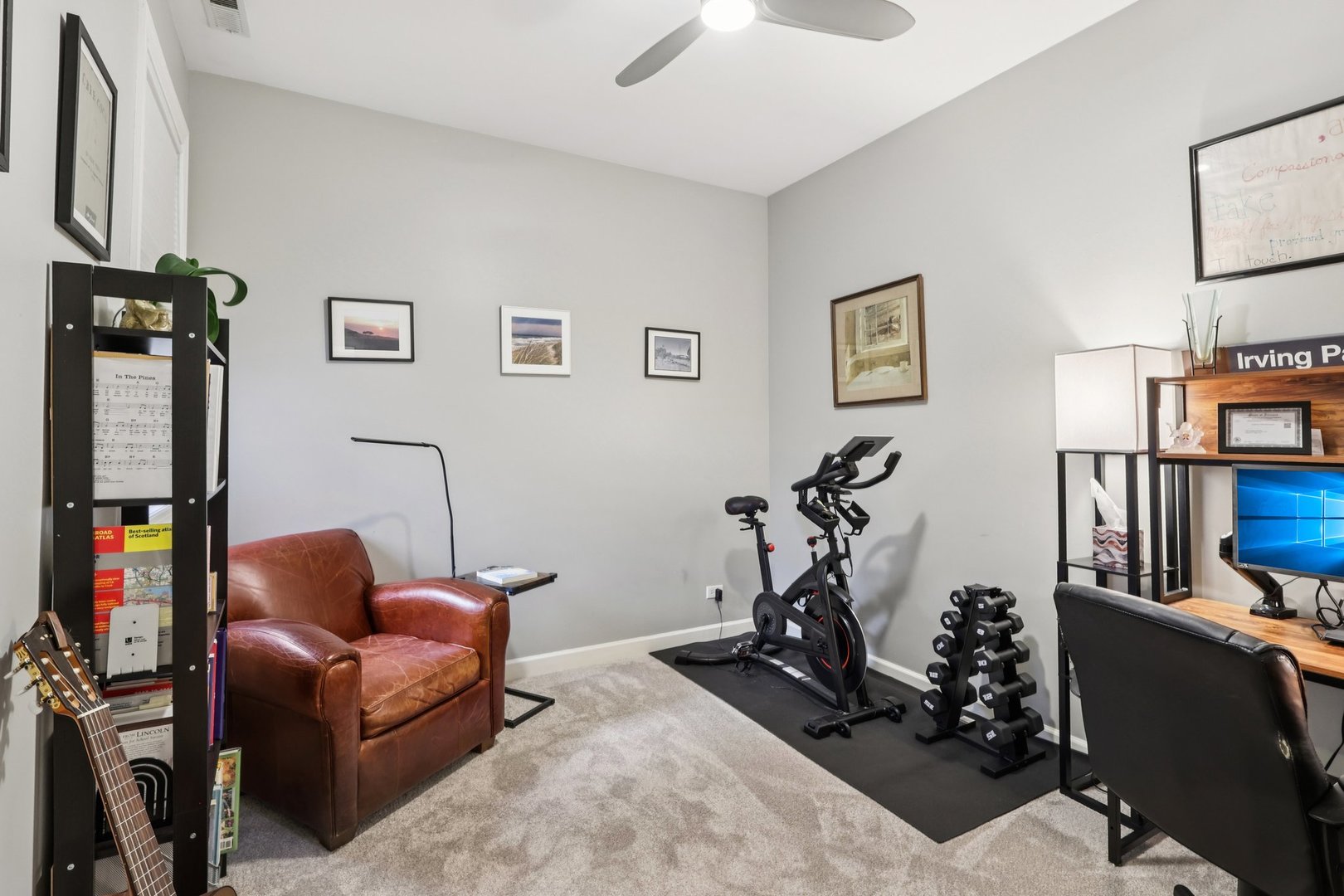 1473 West Irving Park Road, Unit 4E Chicago, IL 60613 - Photo 18 of 44 a living room with furniture gym equipment and a window