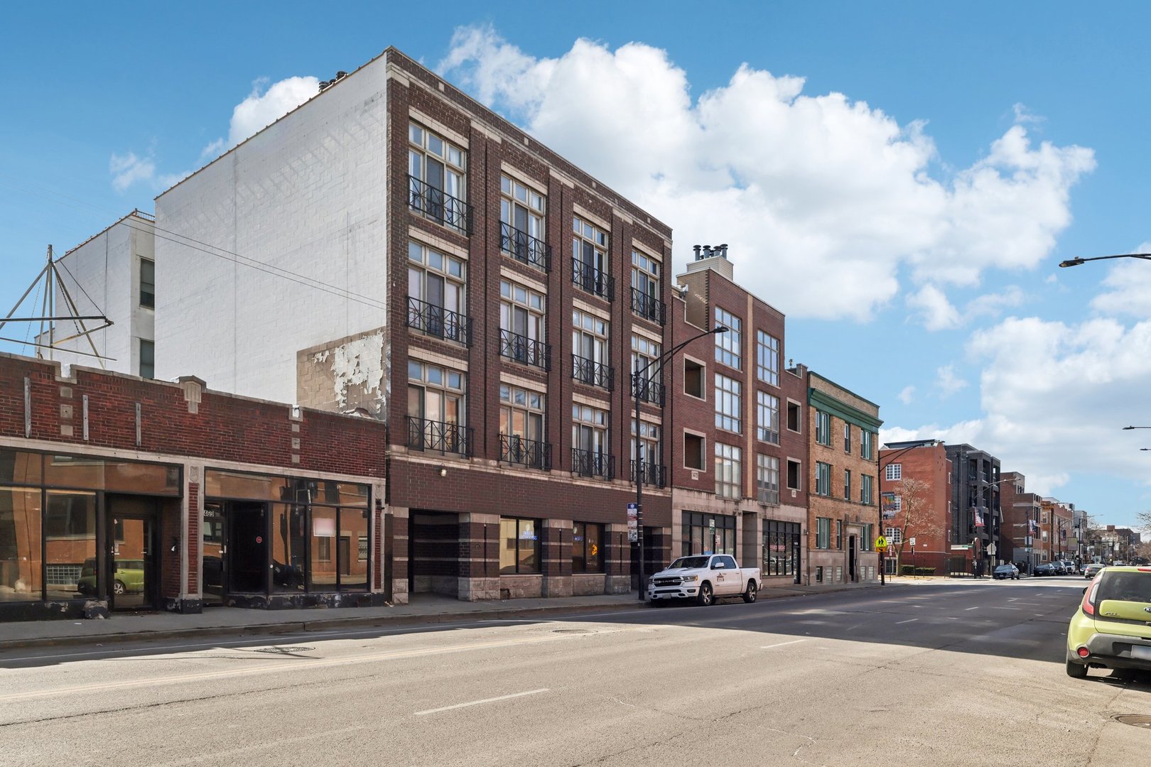 1473 West Irving Park Road, Unit 4E Chicago, IL 60613 - Photo 3 of 44 a view of a building and a street