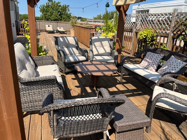 1473 West Irving Park Road, Unit 4E Chicago, IL 60613 - Photo 41 of 44 a view of a chairs and table in the balcony