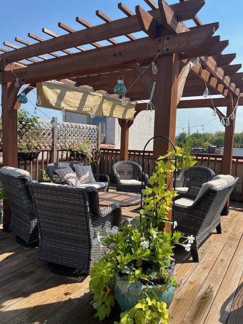 1473 West Irving Park Road, Unit 4E Chicago, IL 60613 - Photo 42 of 44 a outdoor living space with patio furniture