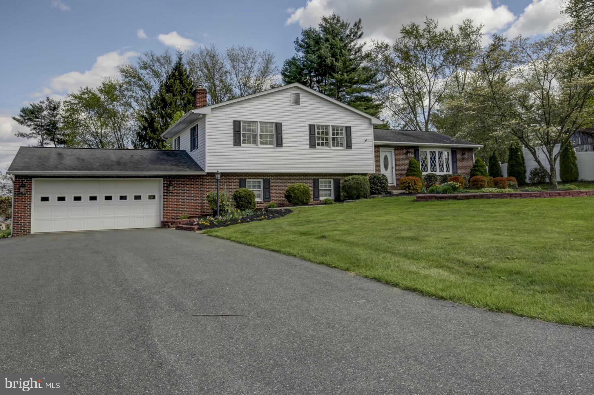 1111 Peachtree Road Fallston, MD 21047 - Photo 1 of 30 a view of a big house with a big yard and large trees