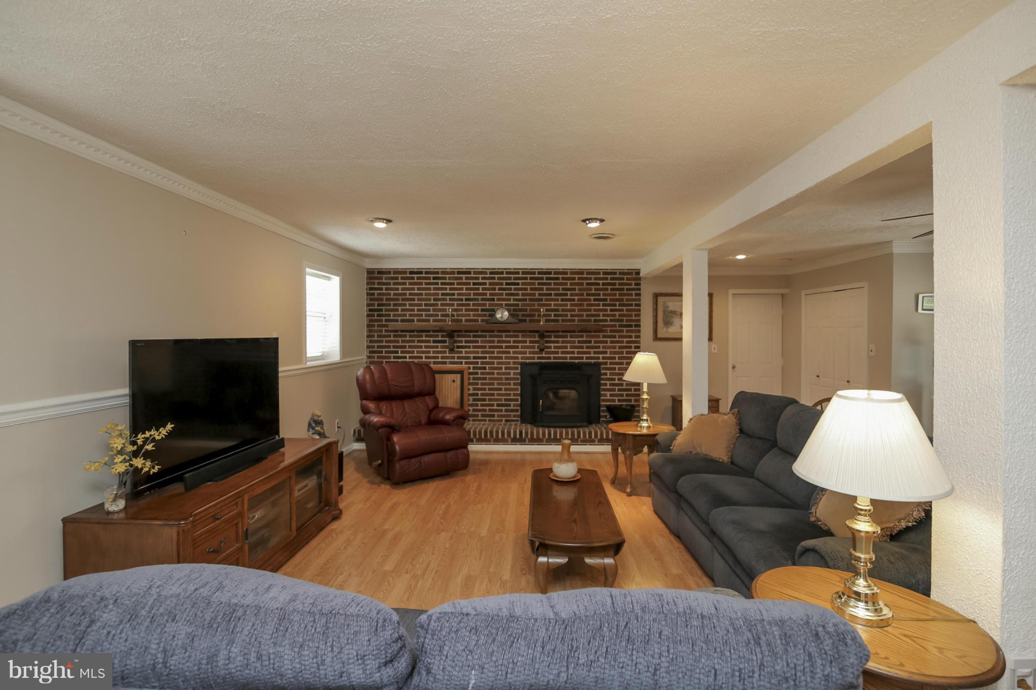 1111 Peachtree Road Fallston, MD 21047 - Photo 11 of 30 a living room with furniture and a flat screen tv