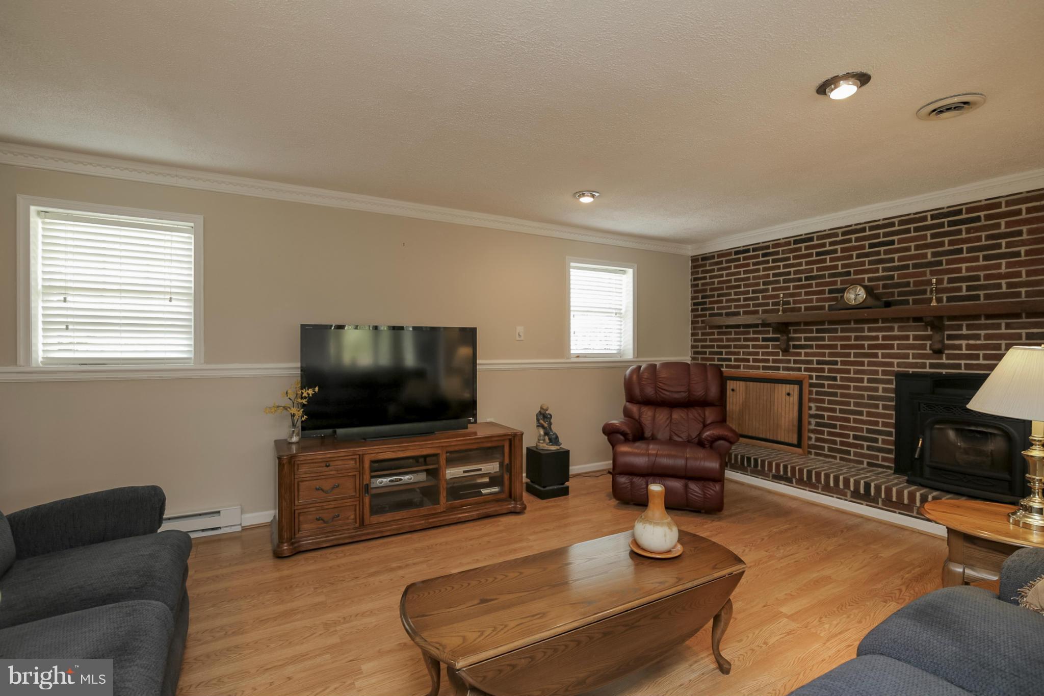 1111 Peachtree Road Fallston, MD 21047 - Photo 13 of 30 a living room with furniture and a flat screen tv