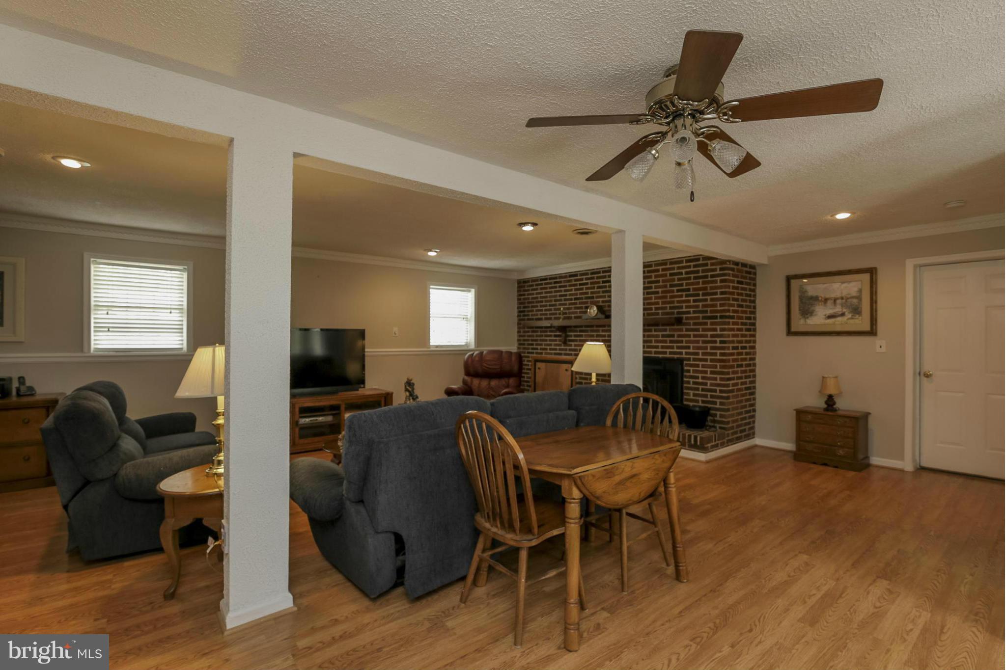 1111 Peachtree Road Fallston, MD 21047 - Photo 14 of 30 a view of a livingroom with furniture and a flat screen tv