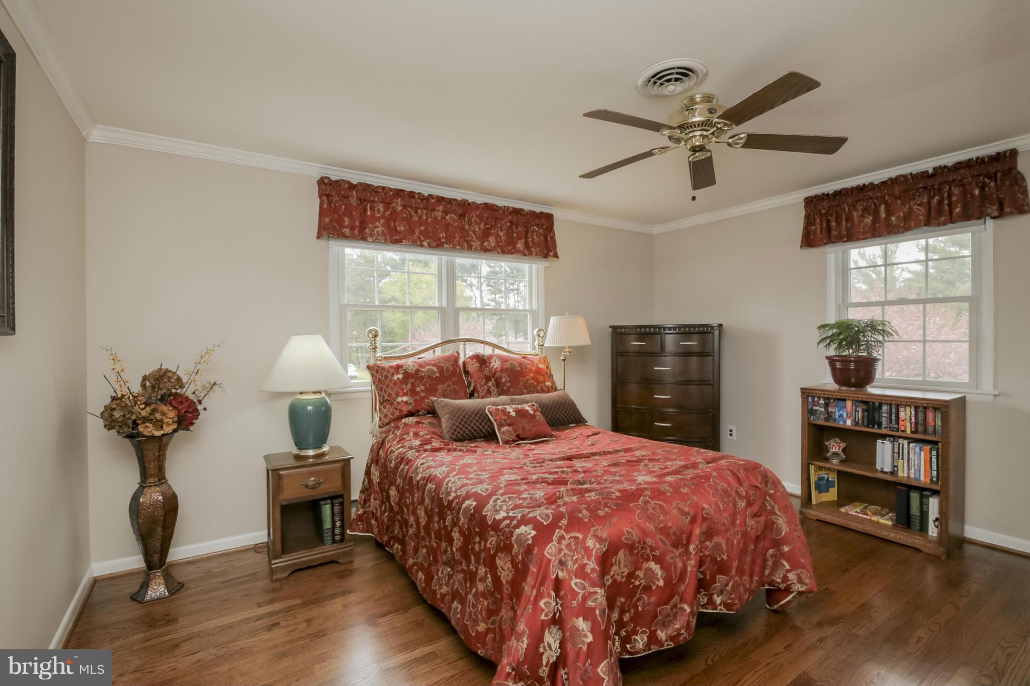 1111 Peachtree Road Fallston, MD 21047 - Photo 21 of 30 a bedroom with a bed and dresser
