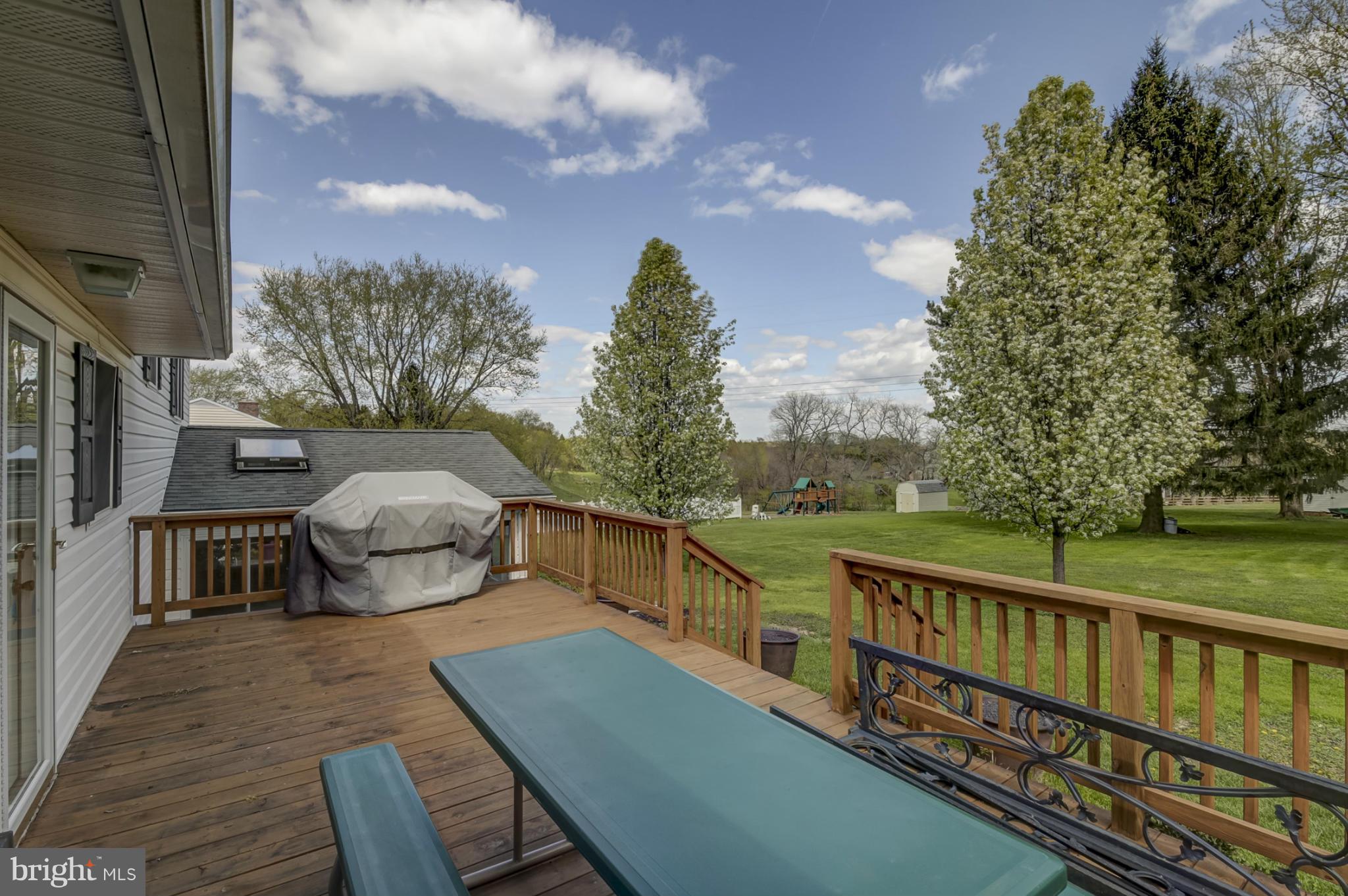 1111 Peachtree Road Fallston, MD 21047 - Photo 27 of 30 a view of a balcony with wooden floor and fence