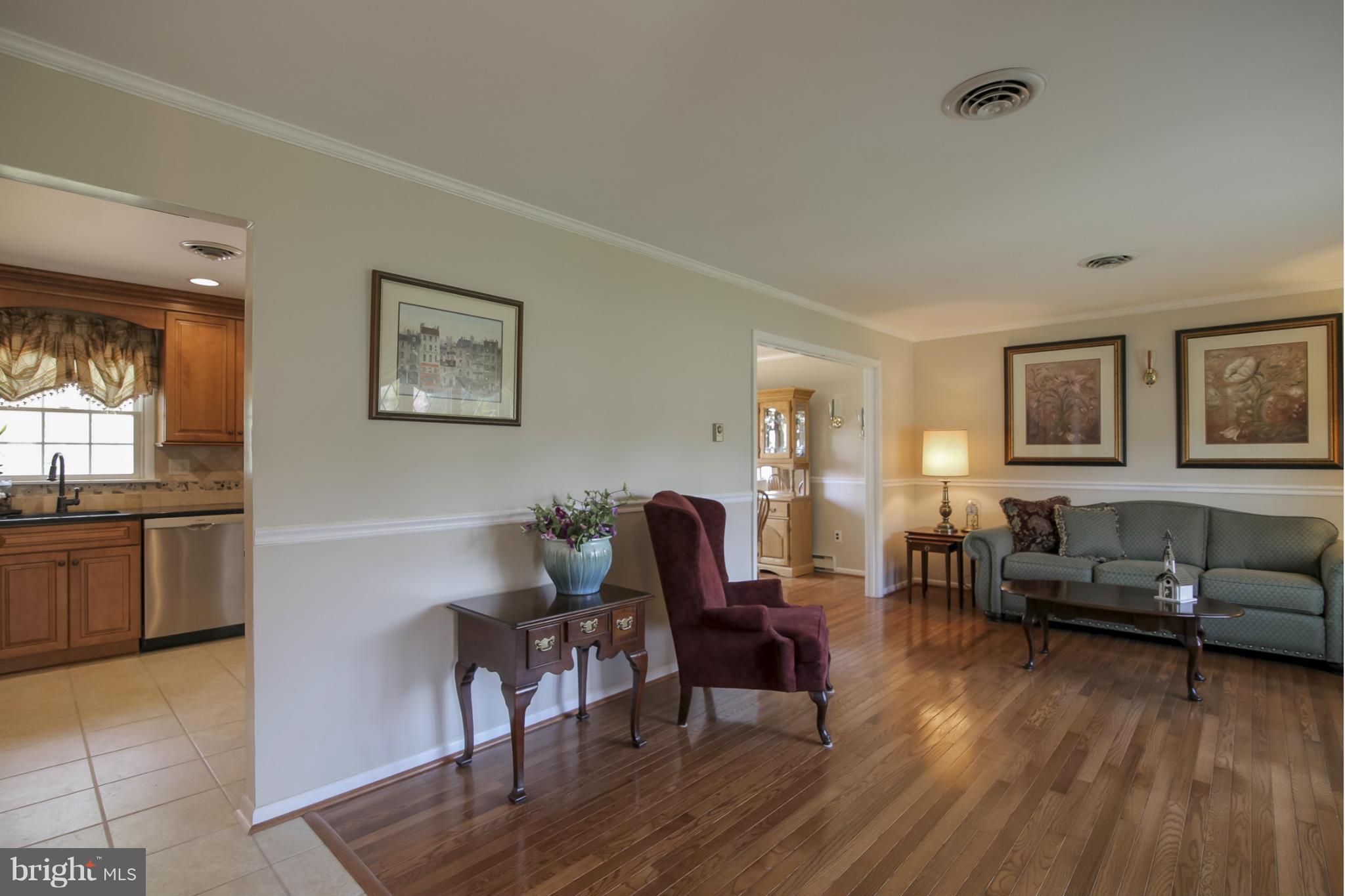 1111 Peachtree Road Fallston, MD 21047 - Photo 4 of 30 a living room with furniture and a wooden floor
