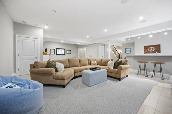 a living room with furniture and a table