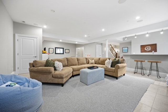 2921 Simpson Street Evanston, IL 60201 - Photo 20 of 27 a living room with furniture and a table