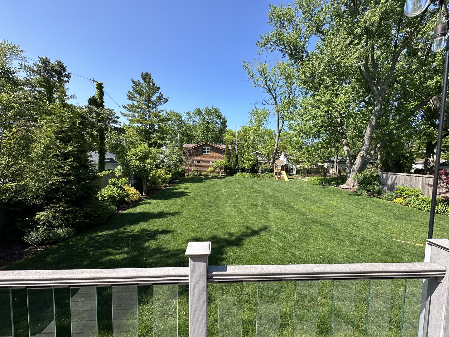 2921 Simpson Street Evanston, IL 60201 - Photo 24 of 27 a view of outdoor space with deck and yard