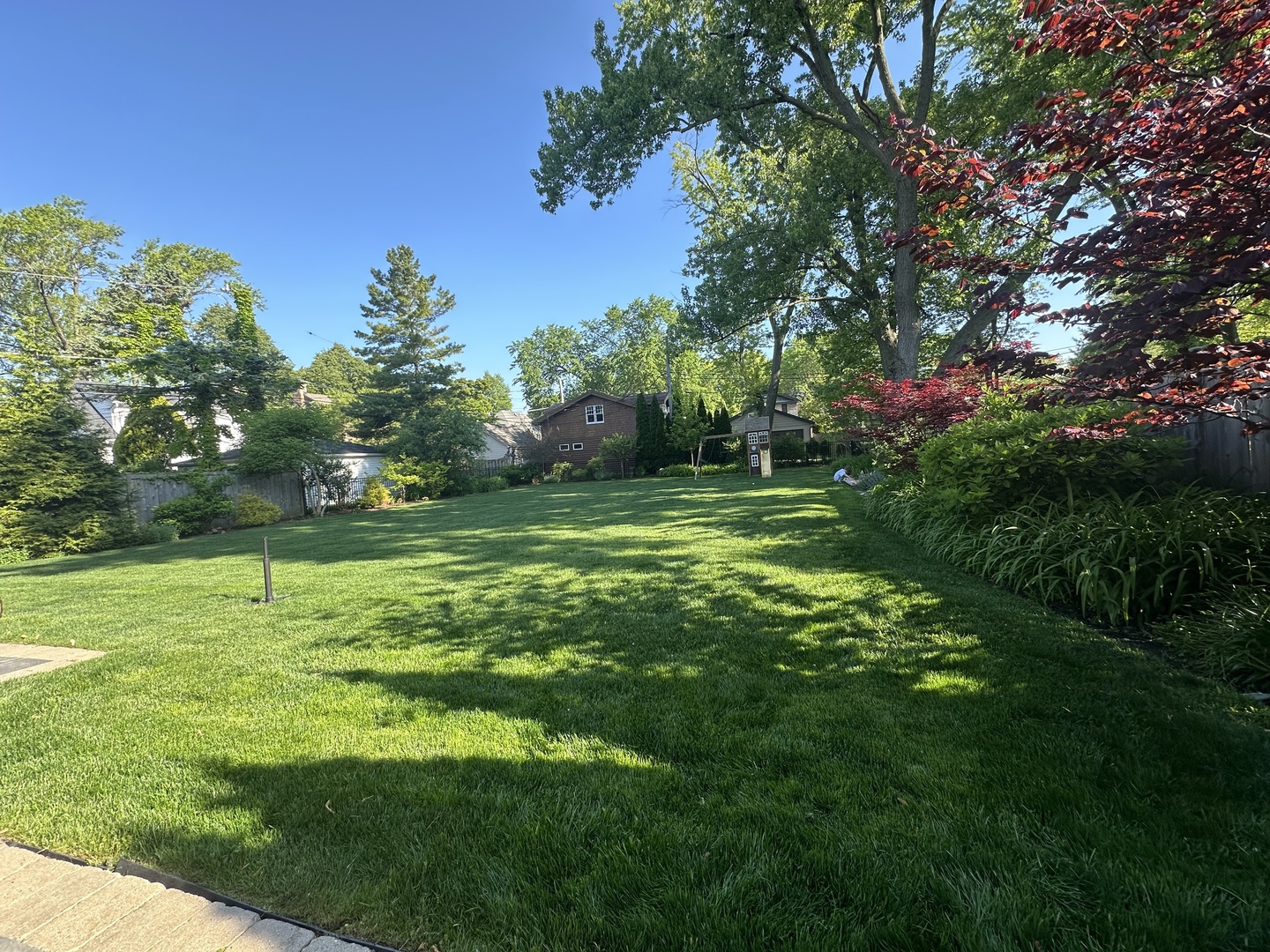 2921 Simpson Street Evanston, IL 60201 - Photo 25 of 27 a backyard of a house with lots of green space and outdoor seating