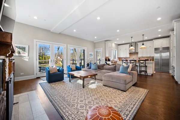 a living room with furniture and a table