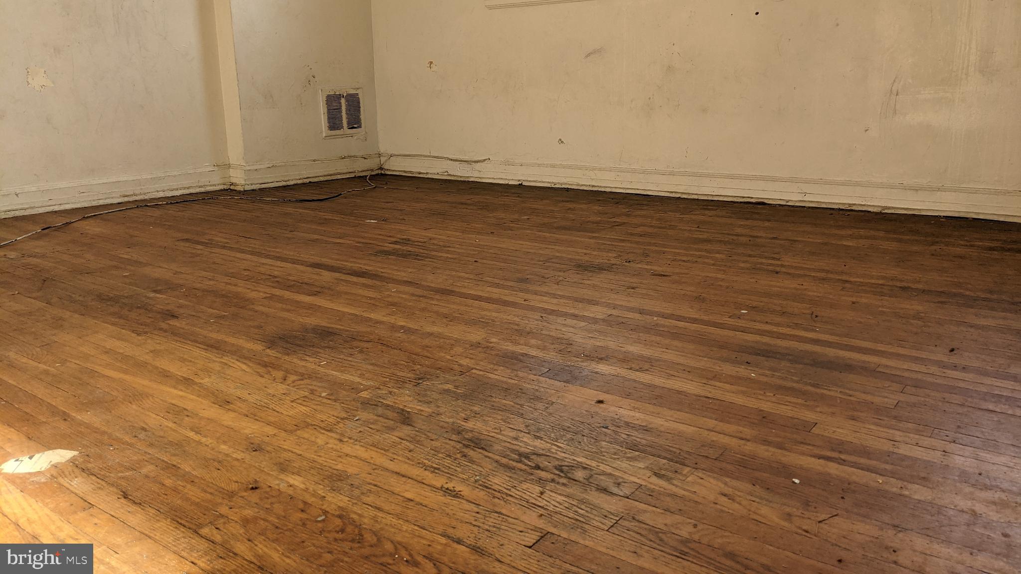 3162 Colorado Road Camden, NJ 08104 - Photo 18 of 21 an empty room with wooden floor