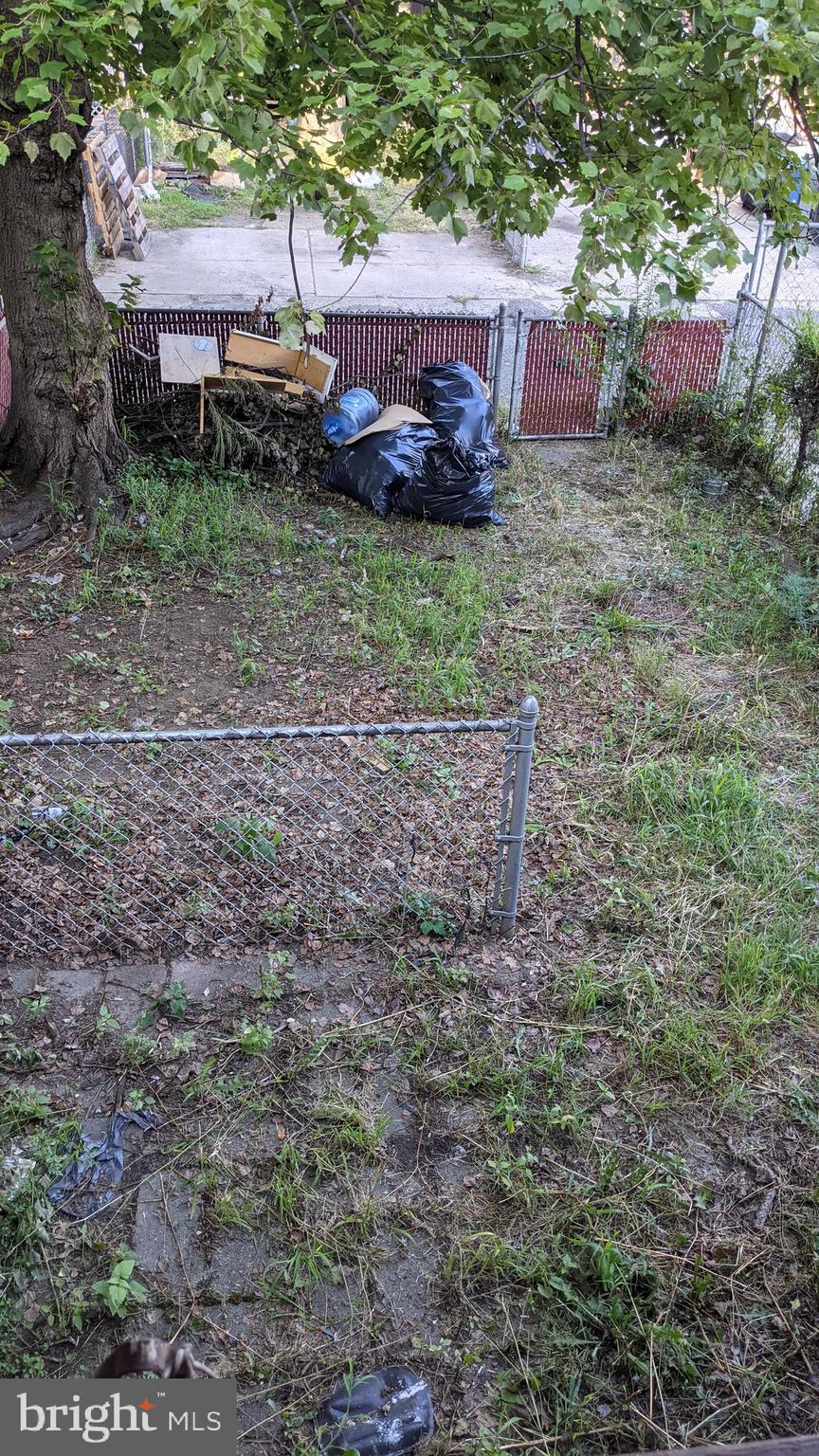 3162 Colorado Road Camden, NJ 08104 - Photo 20 of 21 a backyard of a house with outdoor seating