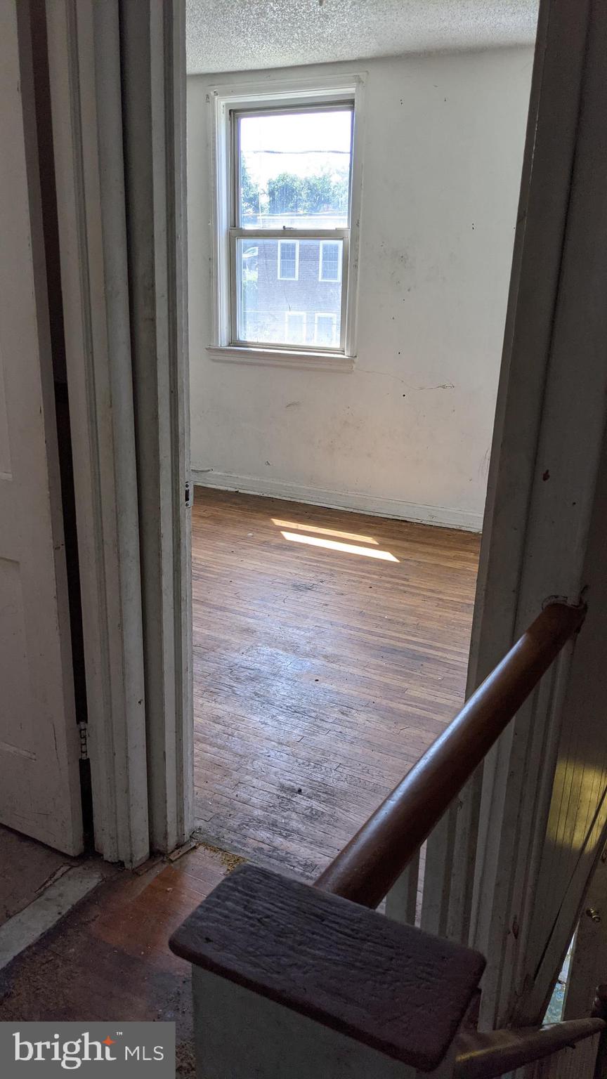3162 Colorado Road Camden, NJ 08104 - Photo 9 of 21 a view of wooden floor in an empty room