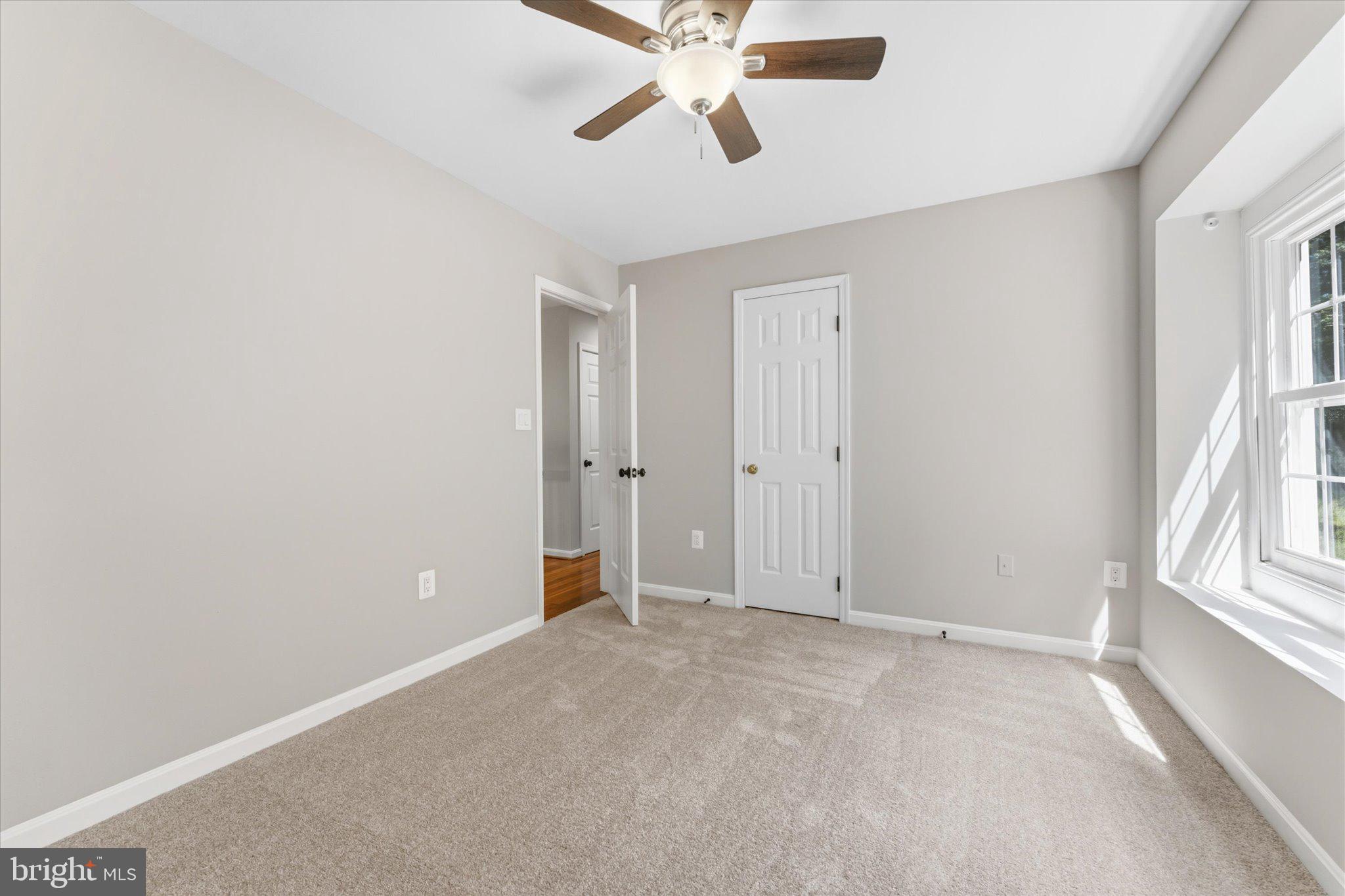 8047 Counselor Road Manassas, VA 20112 - Photo 28 of 55 Comfortable secondary bedroom with generous space.
