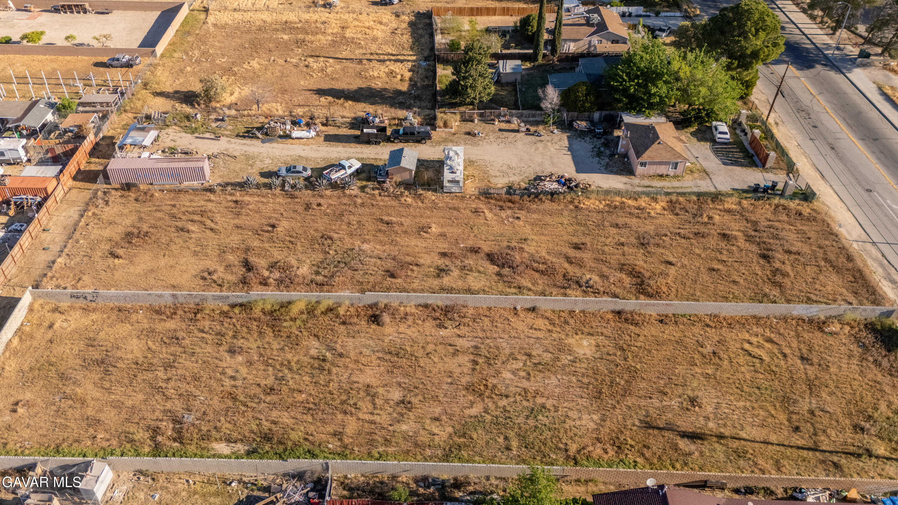 0 17th Street West, Unit K Lancaster, CA 93534 - Photo 11 of 13 a view of a backyard of a house