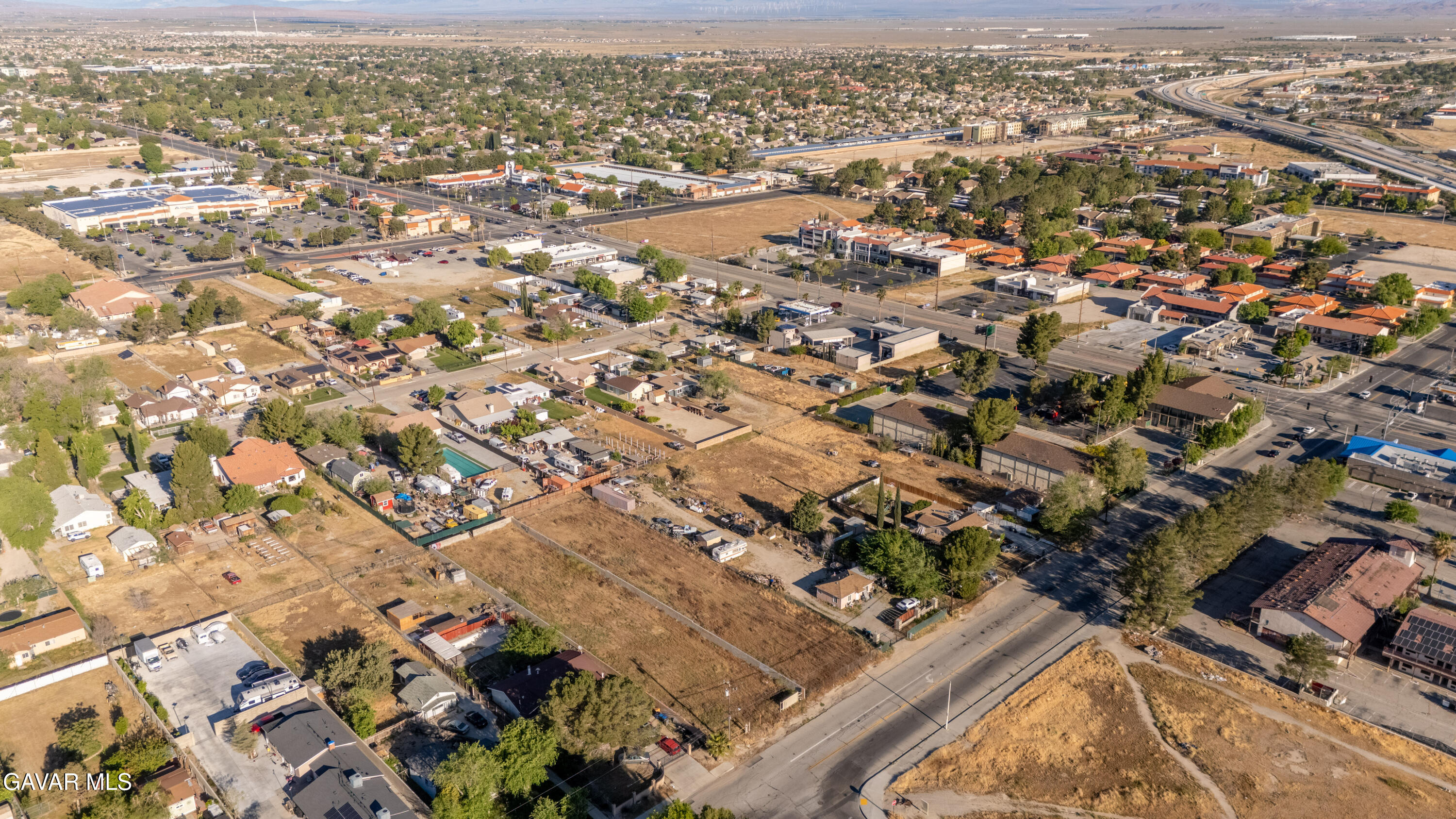 0 17th Street West, Unit K Lancaster, CA 93534 - Photo 13 of 13 an aerial view of residential houses with city view