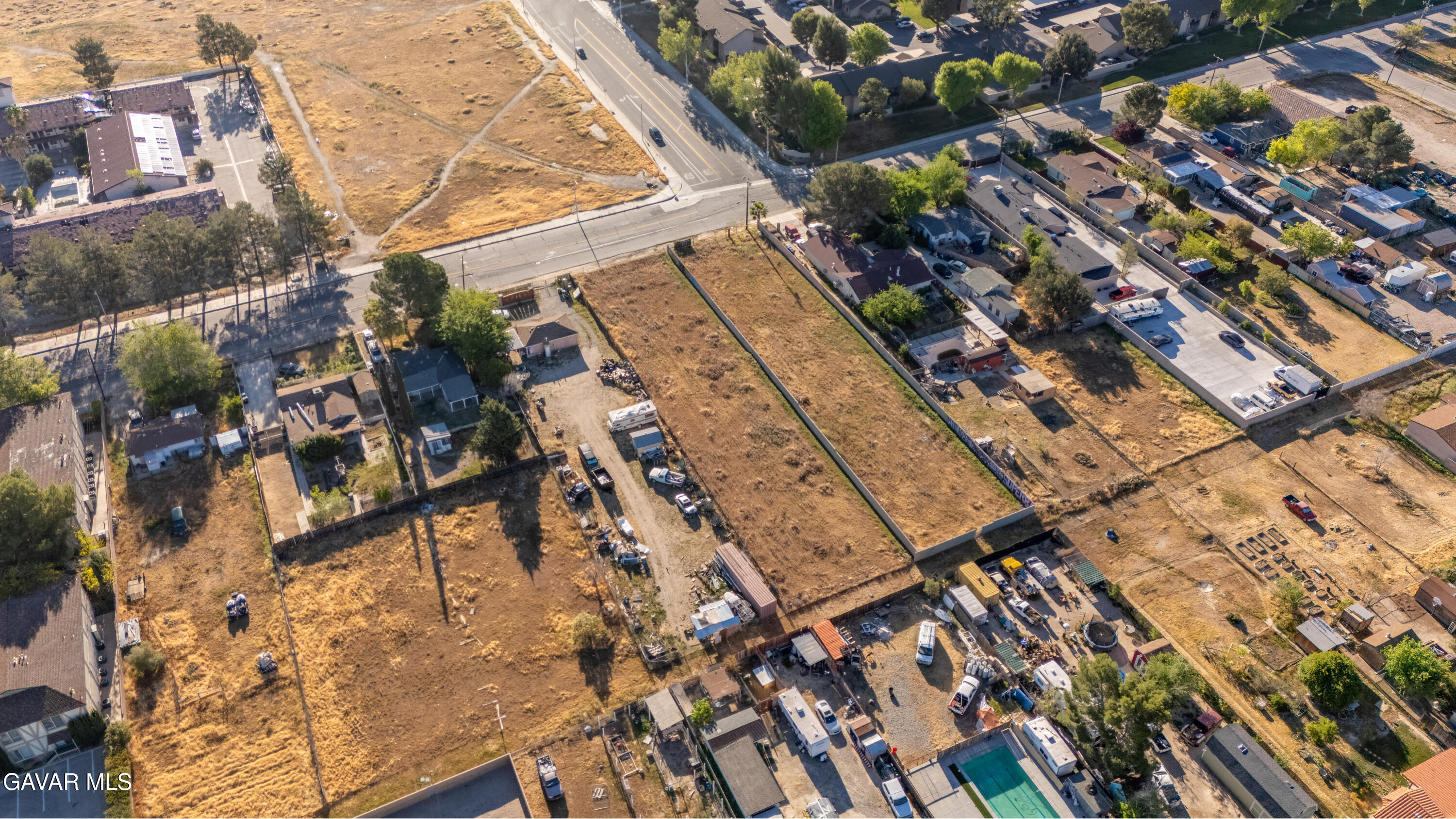 0 17th Street West, Unit K Lancaster, CA 93534 - Photo 2 of 13 an aerial view of residential houses with outdoor space