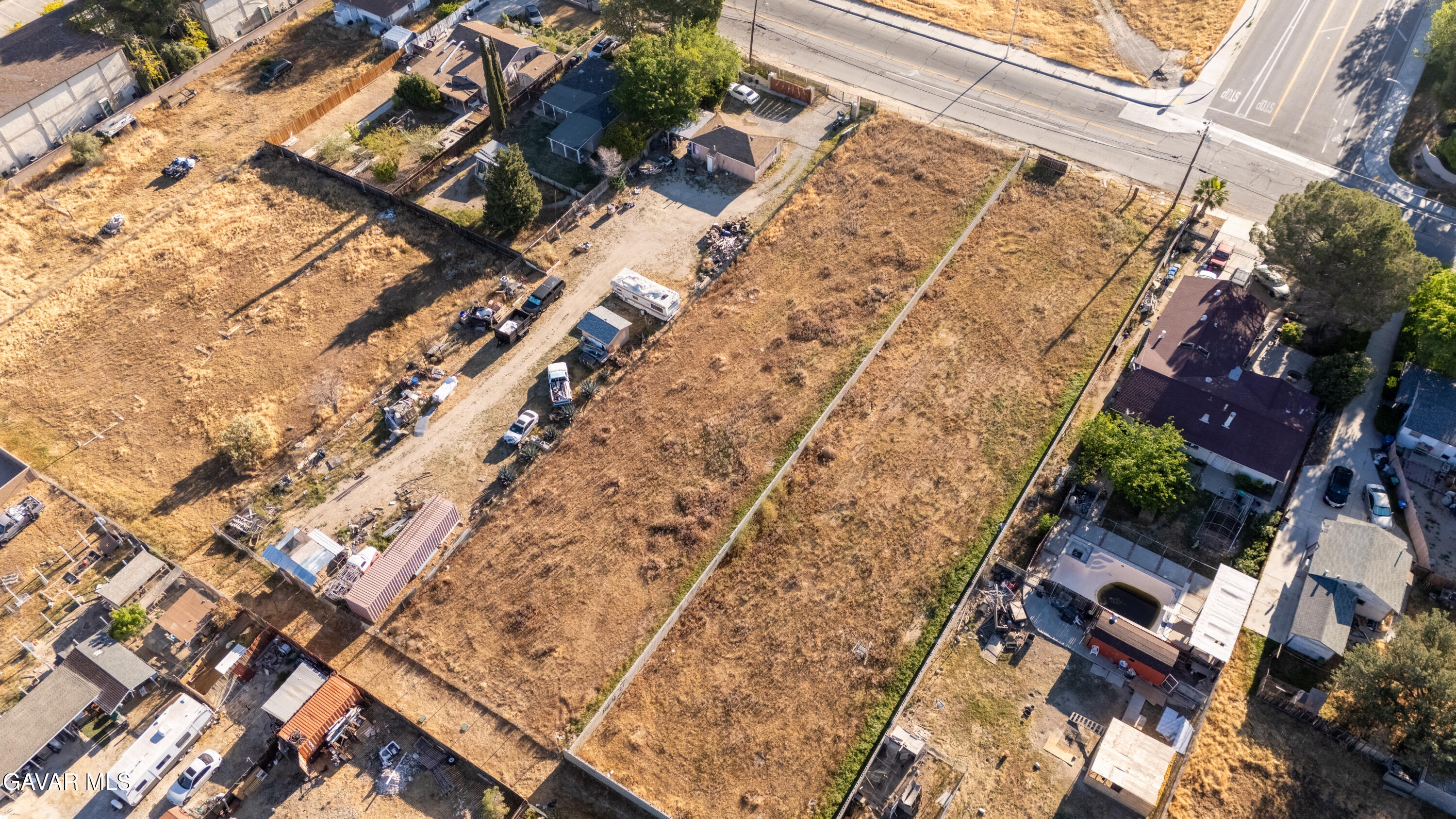 0 17th Street West, Unit K Lancaster, CA 93534 - Photo 6 of 13 a aerial view of a house with a yard