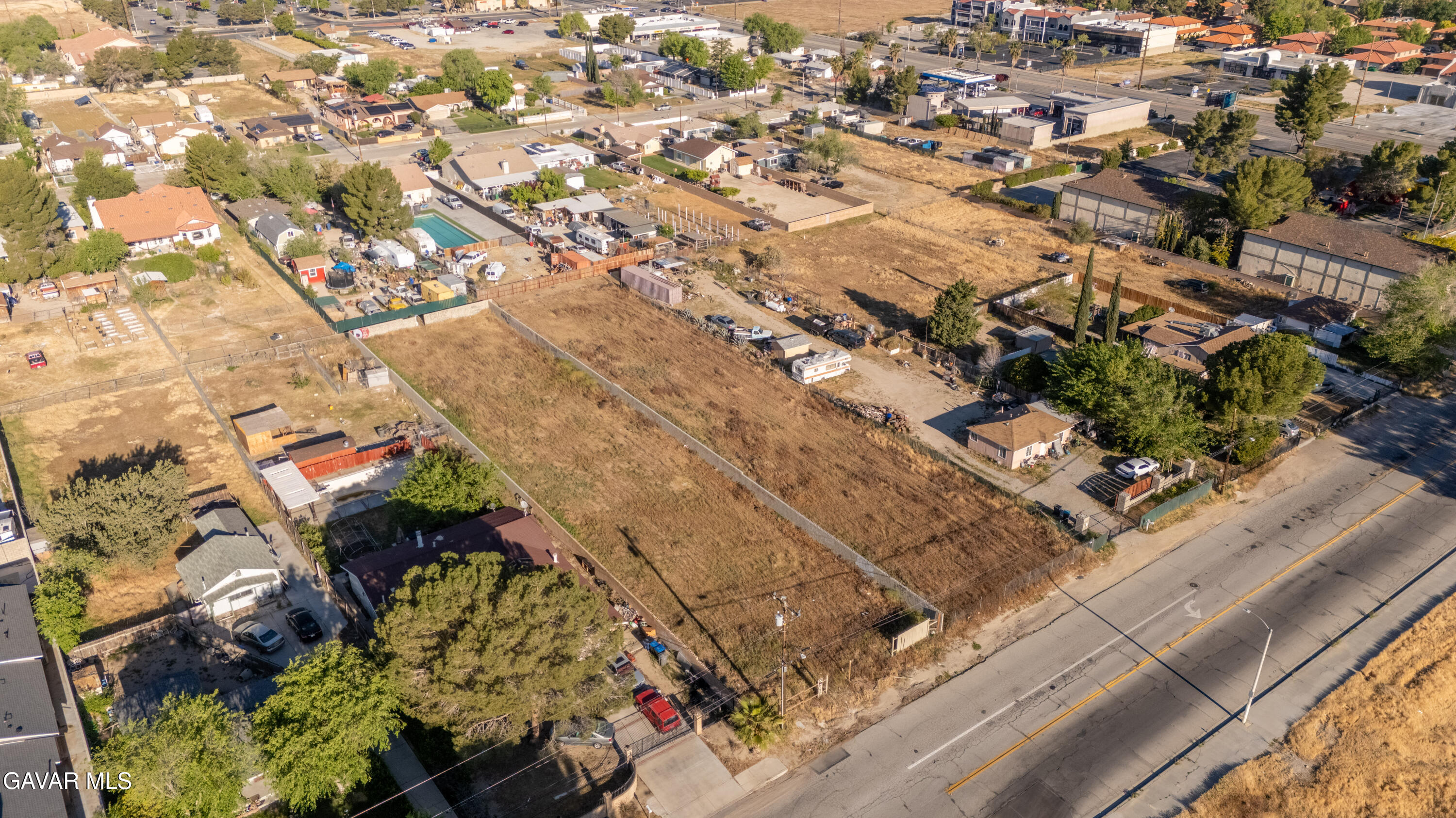 0 17th Street West, Unit K Lancaster, CA 93534 - Photo 10 of 13 an aerial view of residential houses with outdoor space