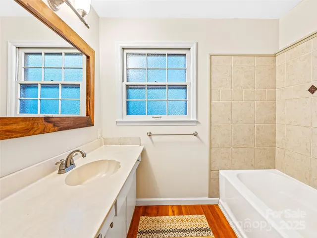 a bathroom with a sink and a bathtub