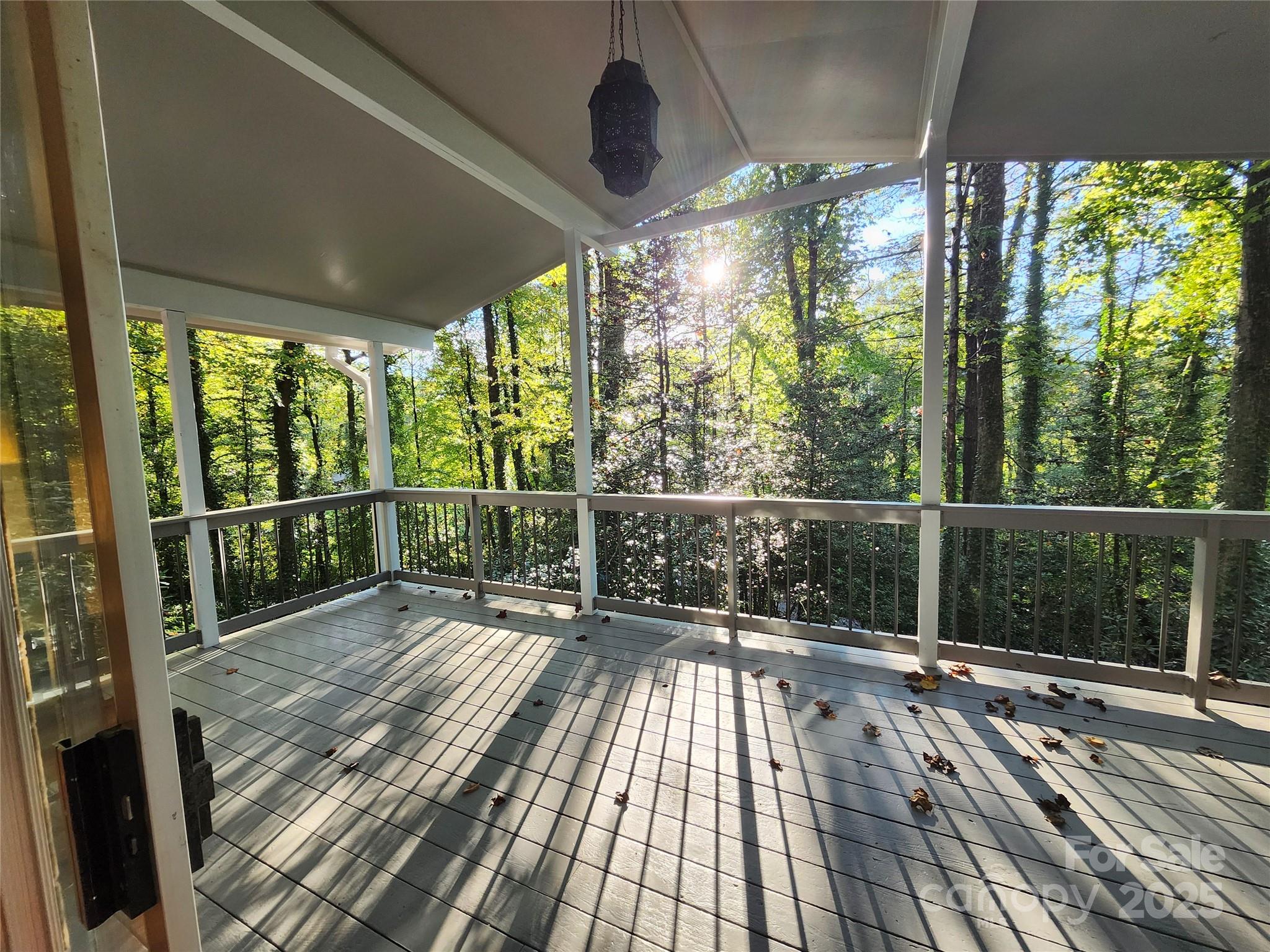 112 Top Of The Mountain Road Hendersonville, NC 28739 - Photo 22 of 28 a view of balcony with wooden floor