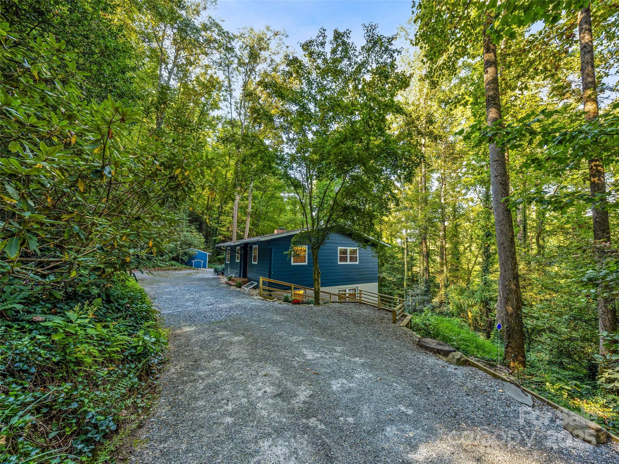 112 Top Of The Mountain Road Hendersonville, NC 28739 - Photo 25 of 28 a view of a outdoor space with a tree