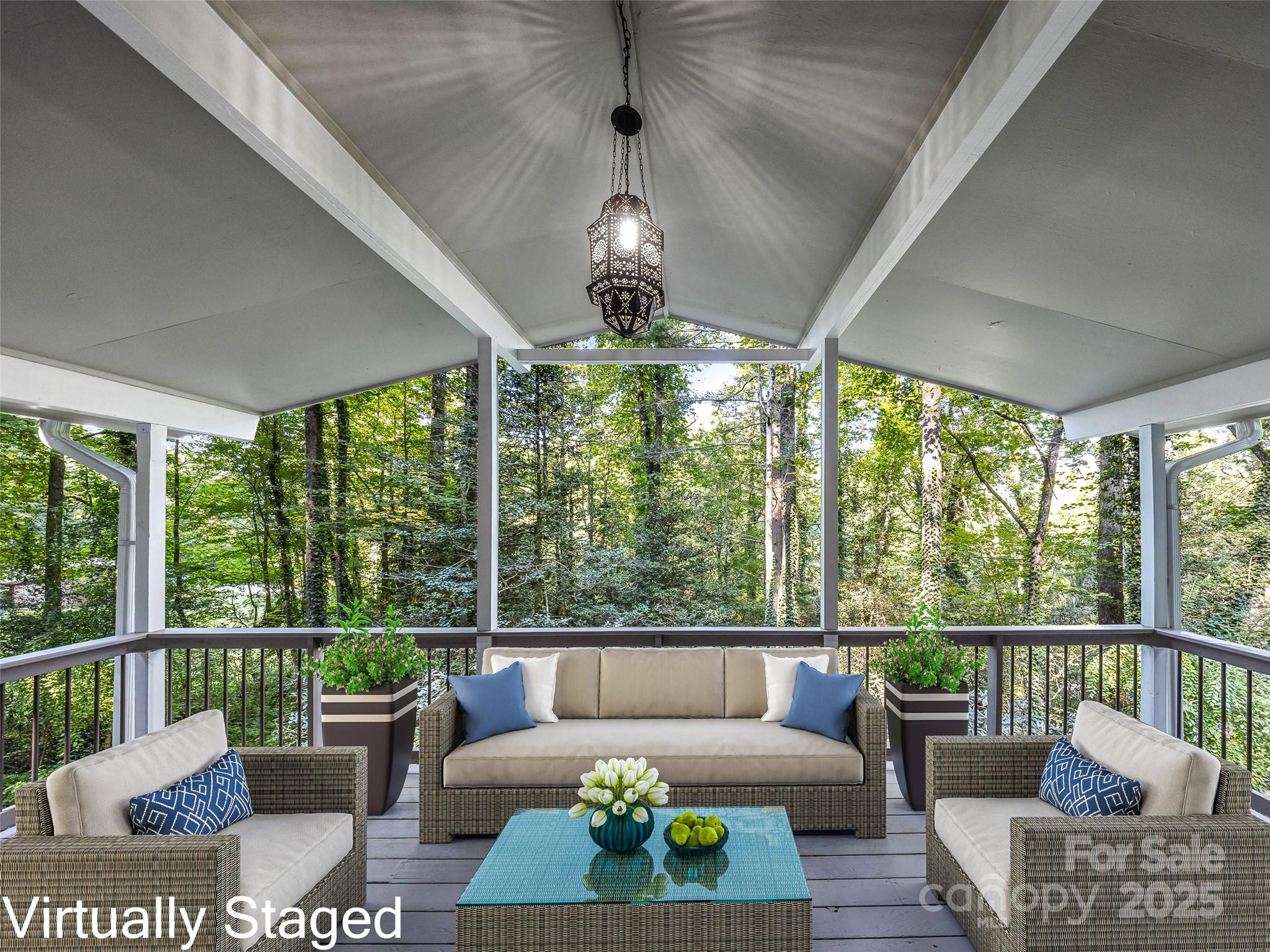 112 Top Of The Mountain Road Hendersonville, NC 28739 - Photo 8 of 28 a living room with furniture and a large window