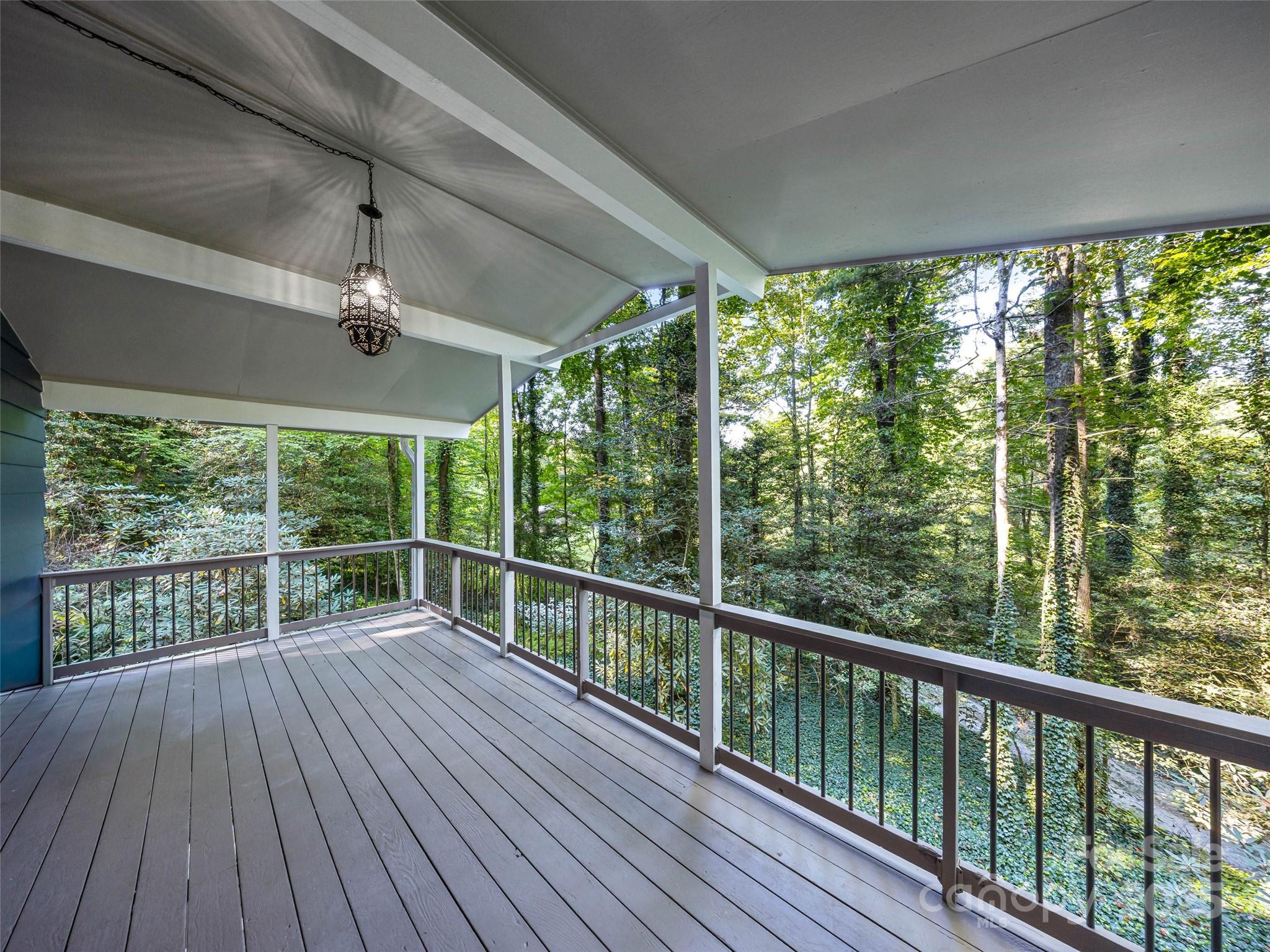 112 Top Of The Mountain Road Hendersonville, NC 28739 - Photo 9 of 28 a view of a balcony with wooden floor