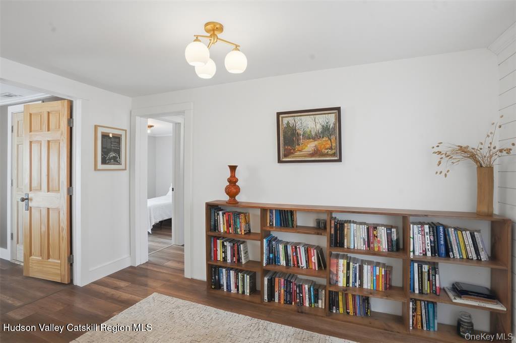 745 Springtown Road Tillson, NY 12486 - Photo 13 of 29 a view of a workspace with bookshelf