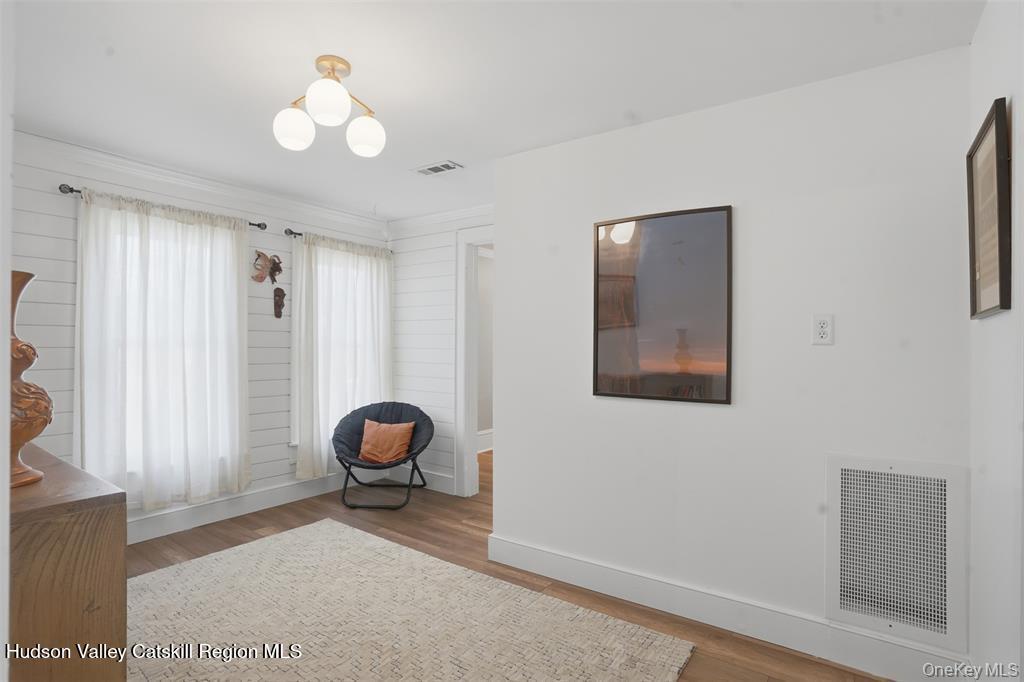 745 Springtown Road Tillson, NY 12486 - Photo 20 of 29 a living room with furniture and a window