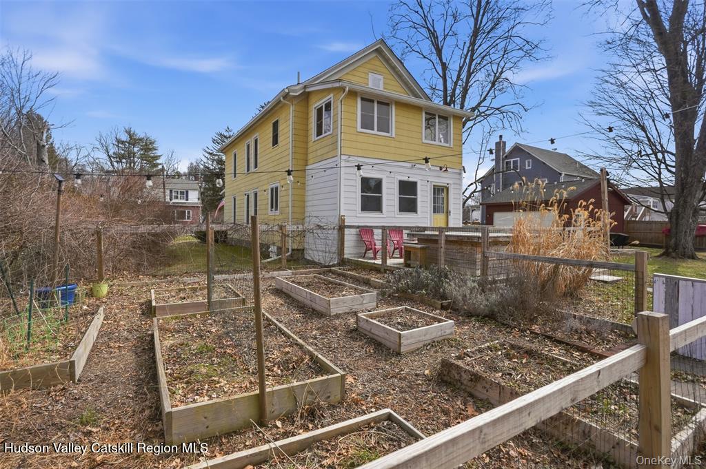 745 Springtown Road Tillson, NY 12486 - Photo 28 of 29 a front view of a house with garden
