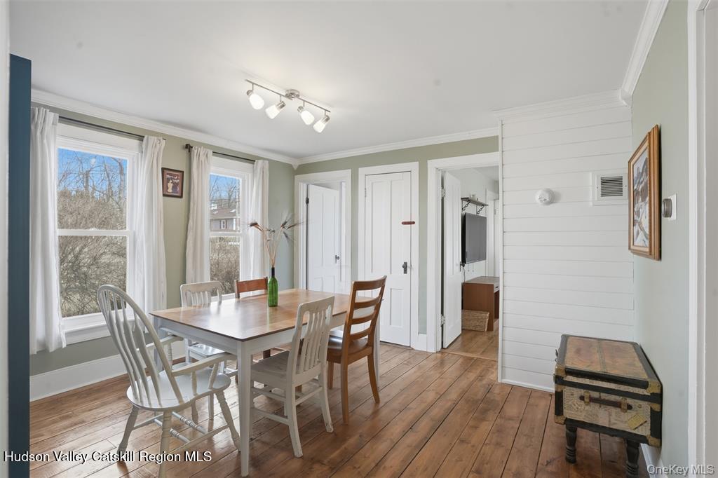 745 Springtown Road Tillson, NY 12486 - Photo 6 of 29 a view of a dining room with furniture window and wooden floor