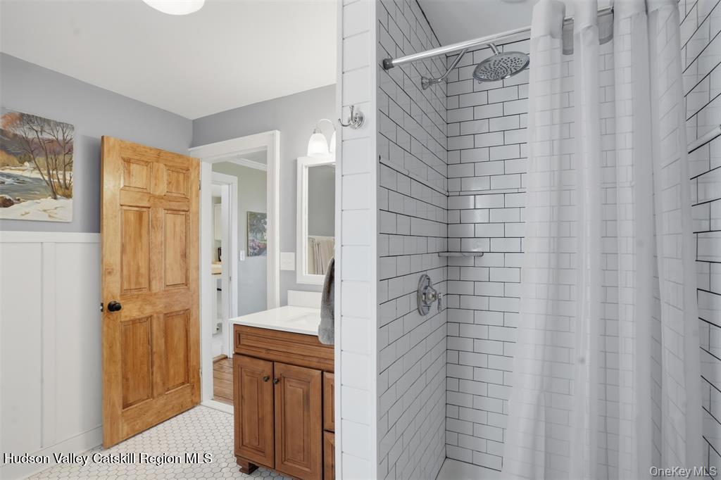 745 Springtown Road Tillson, NY 12486 - Photo 7 of 29 a bathroom with a shower and a sink