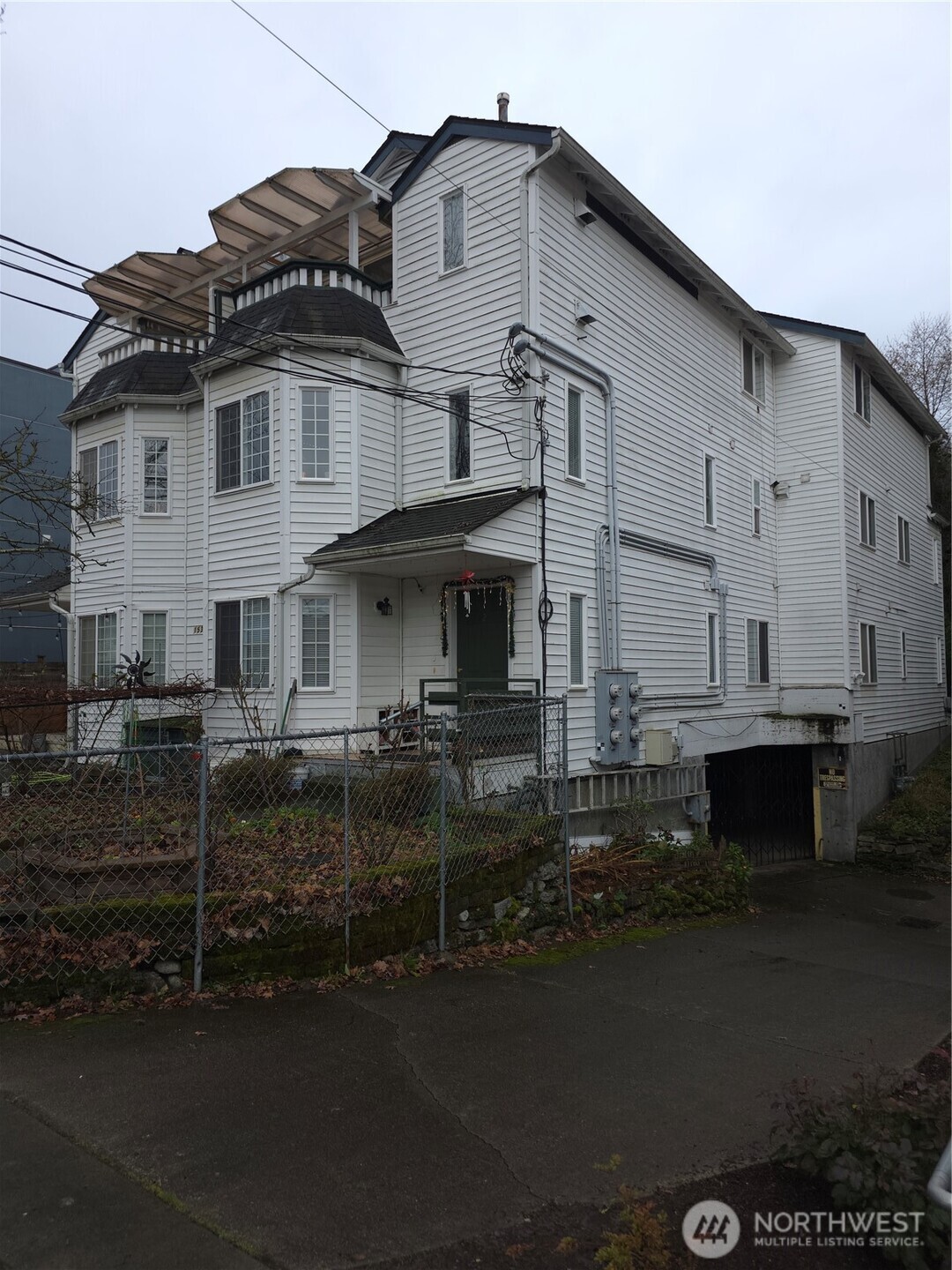1533 18th Avenue South, Unit 5 Seattle, WA 98144 - Photo 20 of 20 a front view of a house with a yard