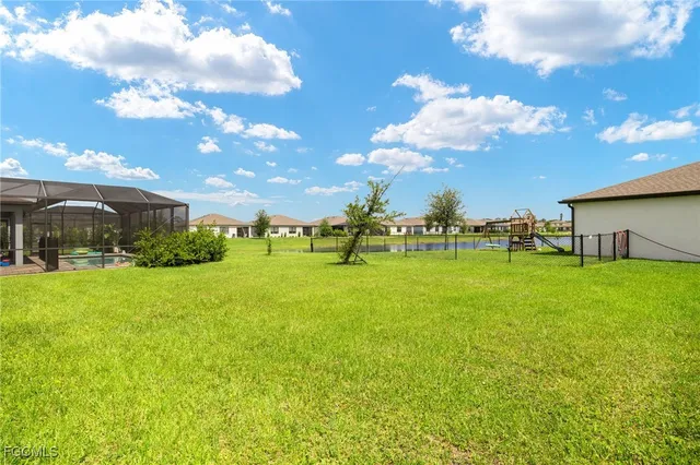 a view of a house with a big yard