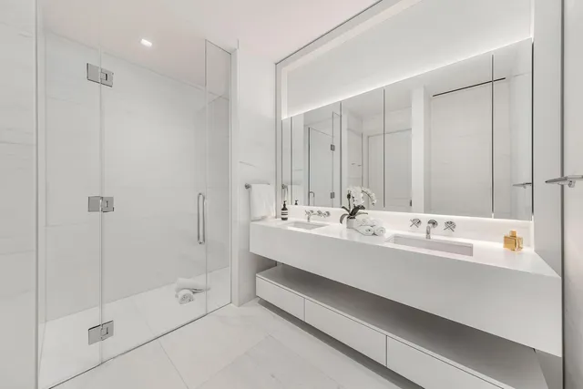 a bedroom with bed and window