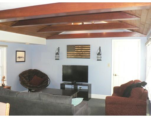 1 East Colonial Road Wilbraham, MA 01095 - Photo 12 of 13 a living room with furniture and a flat screen tv