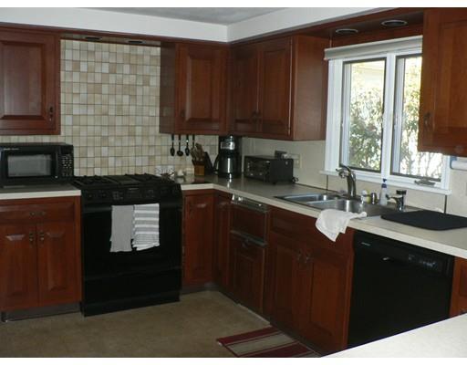 1 East Colonial Road Wilbraham, MA 01095 - Photo 5 of 13 a kitchen with a sink a window and appliances