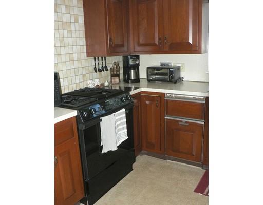 1 East Colonial Road Wilbraham, MA 01095 - Photo 6 of 13 a kitchen with stainless steel appliances granite countertop a stove top oven