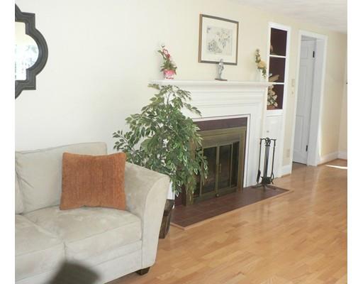 1 East Colonial Road Wilbraham, MA 01095 - Photo 10 of 13 a living room with furniture and a fireplace