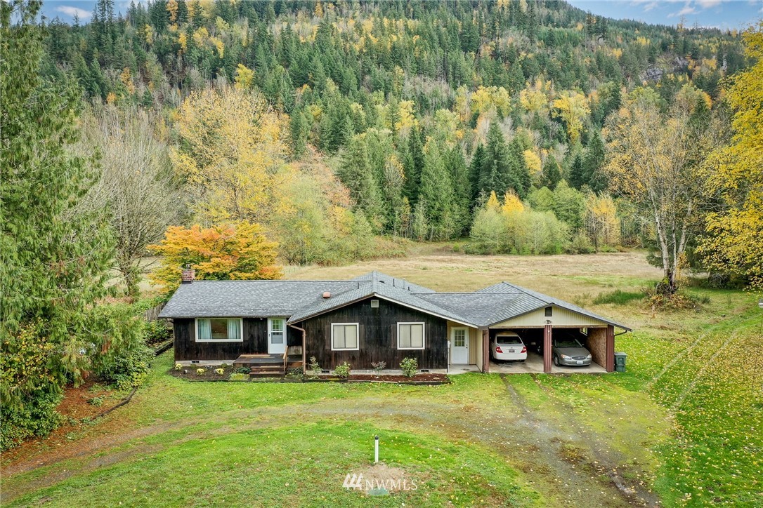 6130 North Fork Road Deming, WA 98244 - Photo 2 of 22 a house with a big yard