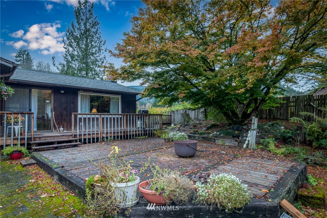 6130 North Fork Road Deming, WA 98244 - Photo 18 of 22 a view of a house with backyard and sitting area