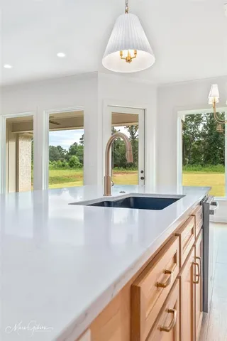 a view of an entryway with chandelier