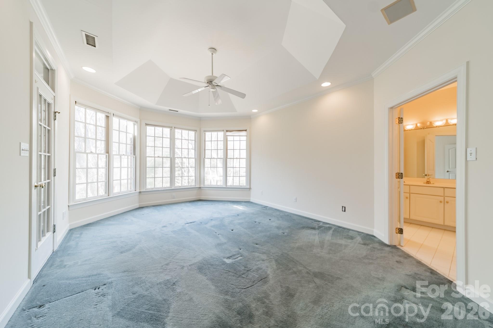 316 Kimberly Road Davidson, NC 28036 - Photo 17 of 37 a view of an empty room with a window