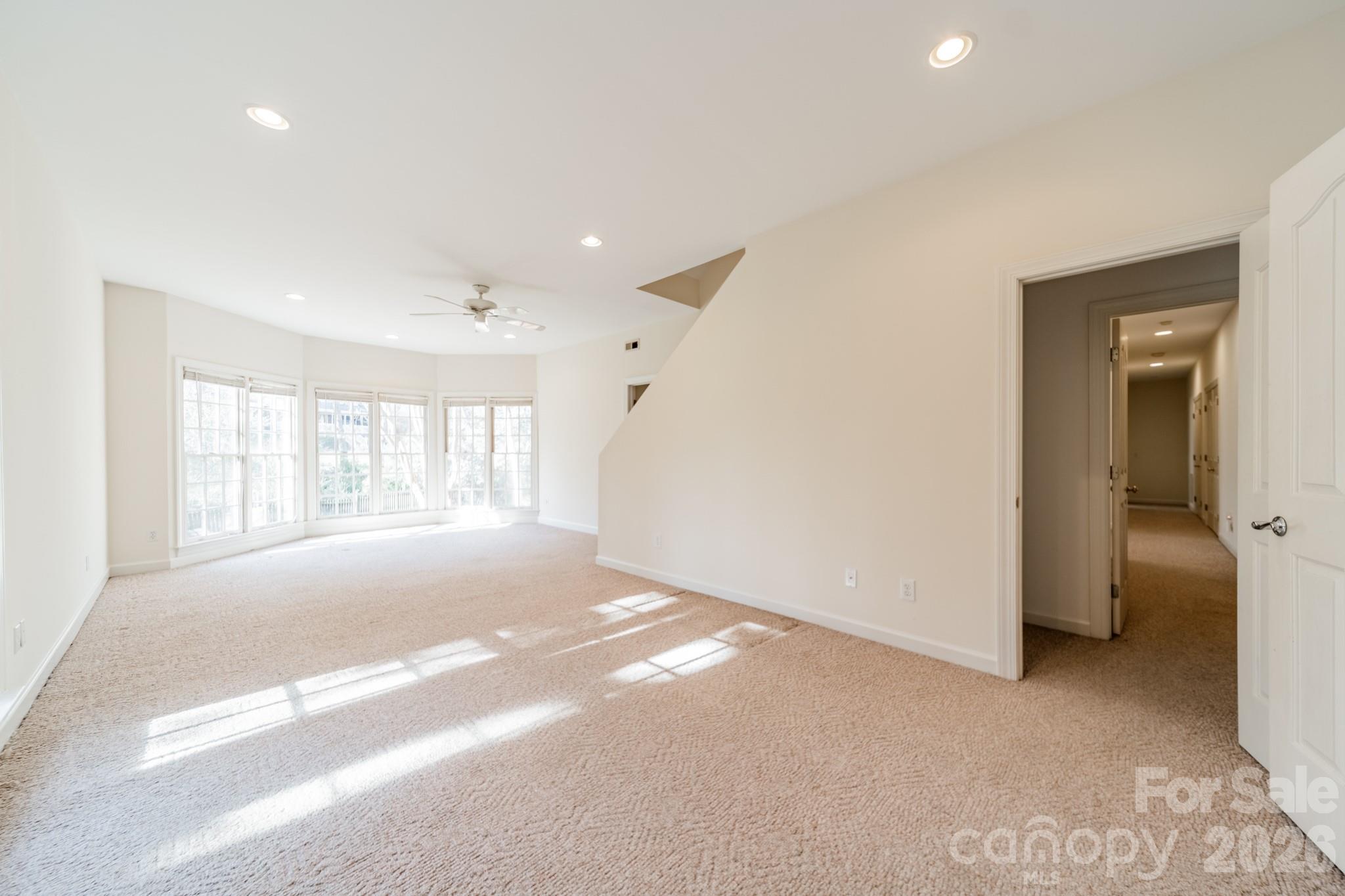 316 Kimberly Road Davidson, NC 28036 - Photo 24 of 37 a view of an empty room with a window